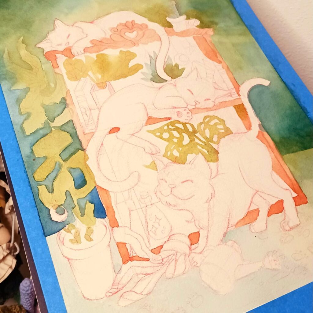 A watercolor painting work in progress by Luna Topaz featuring three cats relaxing on a bookshelf. The piece uses soft washes of orange, green, and blue to build a cozy, whimsical atmosphere.