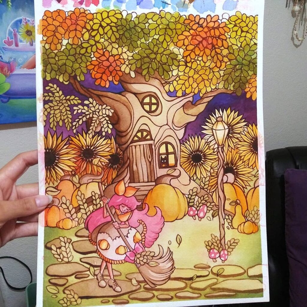 A finished watercolor painting by Luna Topaz showing a whimsical treehouse surrounded by sunflowers, mushrooms, pumpkins, and fall foliage. A pink‑haired girl is sweeping the path outside of her house. A cat sits in the window watching her.
