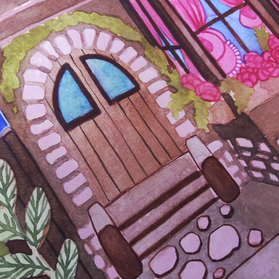 A close‑up of Luna Topaz’s "Spring Vibes" watercolor painting showing a wooden arched door framed by light stonework and green vines. Pink flowers bloom under the window above, and leafy plants surround the doorway, creating a cozy, welcoming atmosphere.
